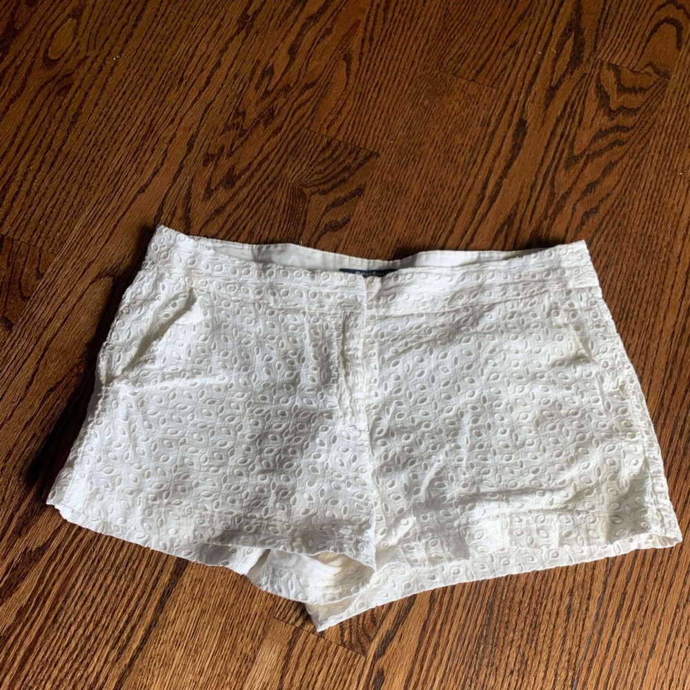 White lined eyelet style shorts size 8